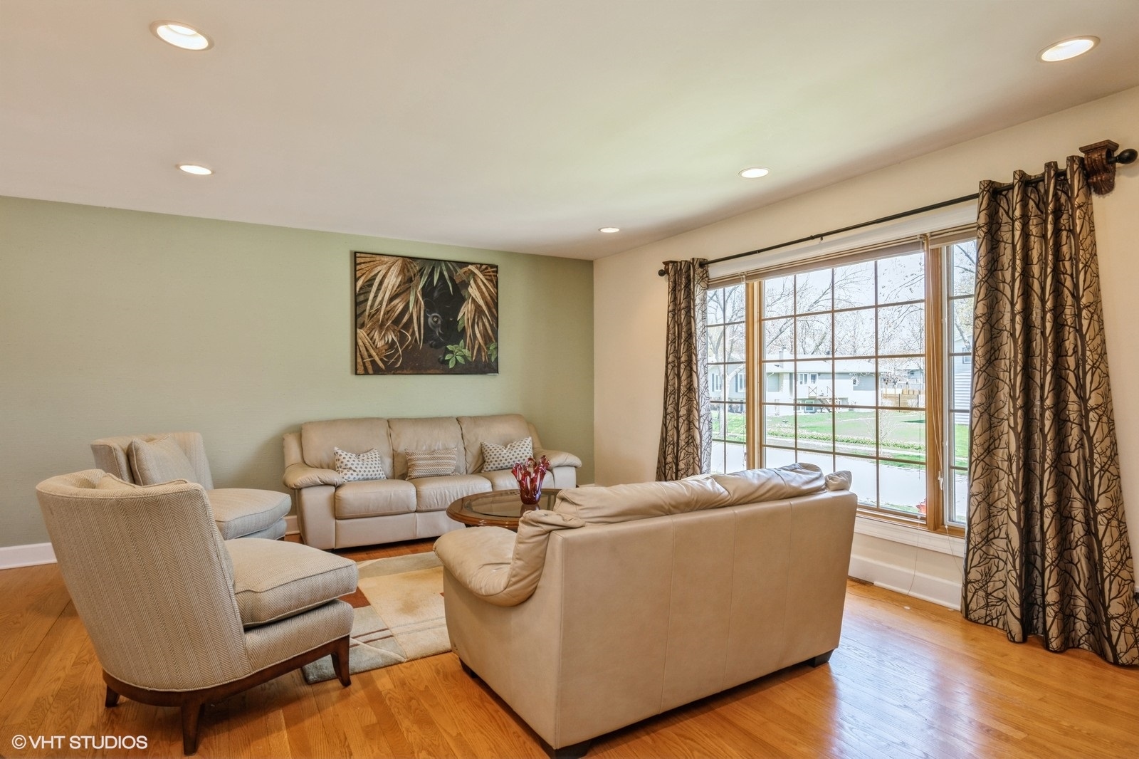 4130 North Firestone Drive Hoffman Estates, IL 60192 - Photo 3 of 27 a living room with furniture and a large window