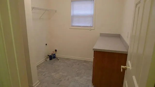 a room with a table and a cabinet