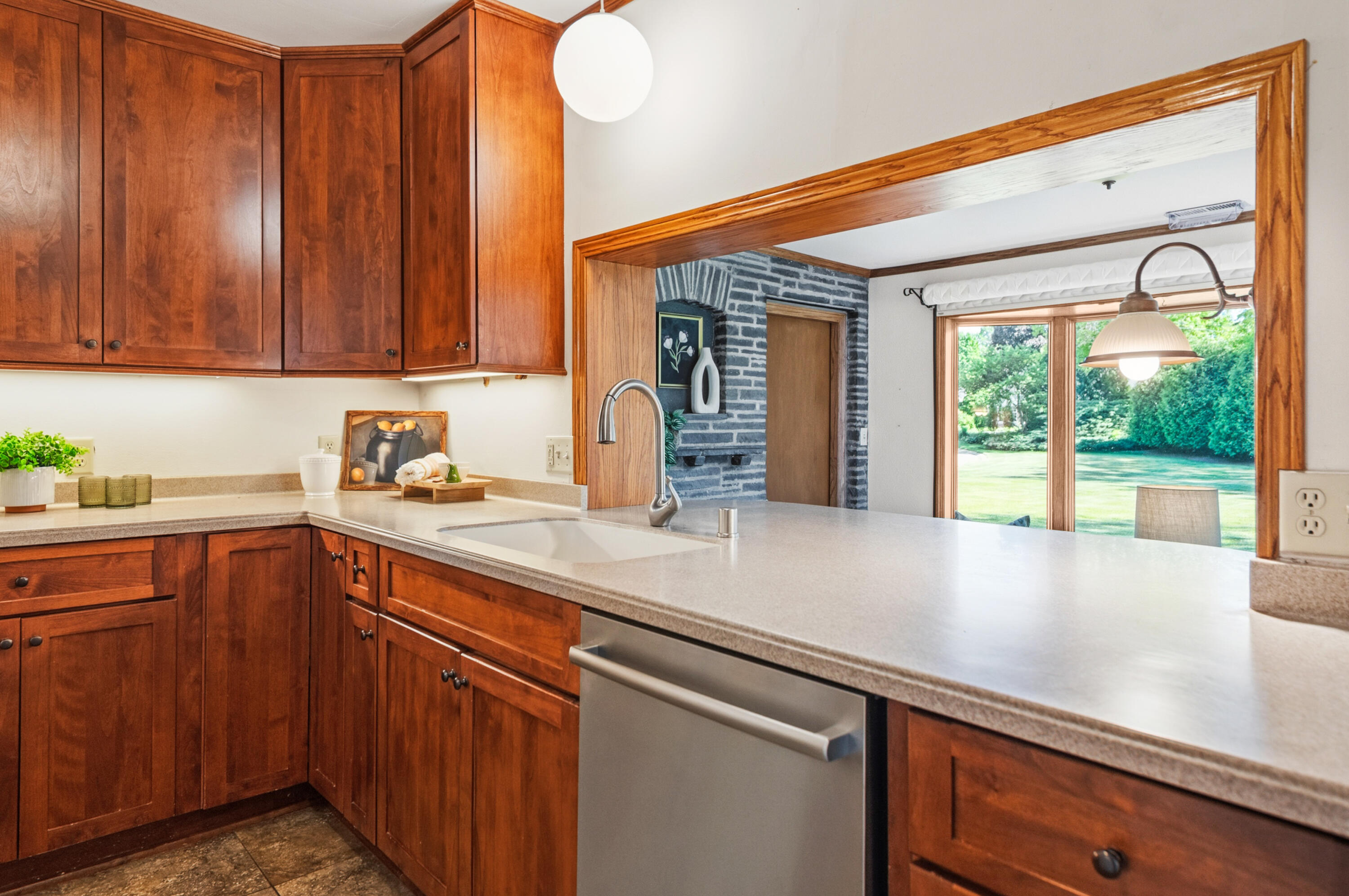 115 West Green Tree Road Glendale, WI 53217 - Photo 21 of 56 Kitchen to Sunroom