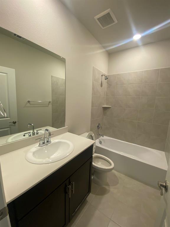 3220 Shortgrass Lane Melissa, TX 75454 - Photo 12 of 17 a bathroom with a sink a toilet and shower