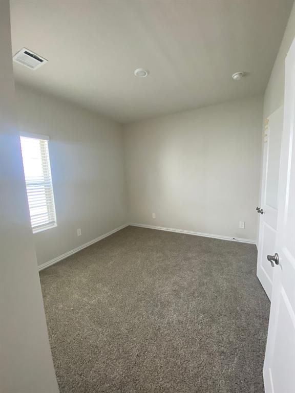 3220 Shortgrass Lane Melissa, TX 75454 - Photo 14 of 17 an empty room with a natural light