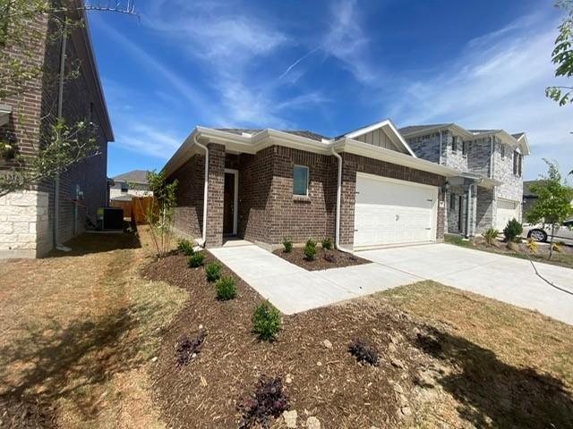 3220 Shortgrass Lane Melissa, TX 75454 - Photo 2 of 17 a front view of a house with a yard