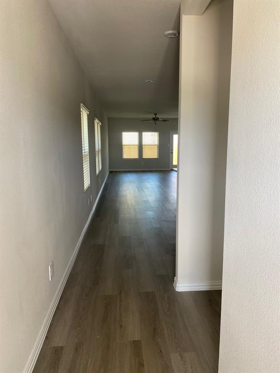 3220 Shortgrass Lane Melissa, TX 75454 - Photo 3 of 17 an empty room with wooden floor and windows