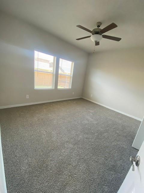 3220 Shortgrass Lane Melissa, TX 75454 - Photo 9 of 17 an empty room with windows and fan view