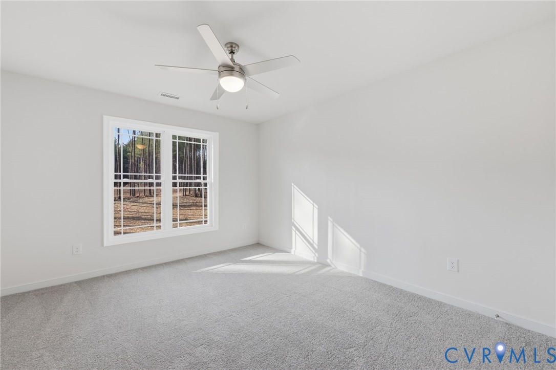 2460 Ballsville Road Powhatan, VA 23139 - Photo 19 of 28 a view of an empty room with a window