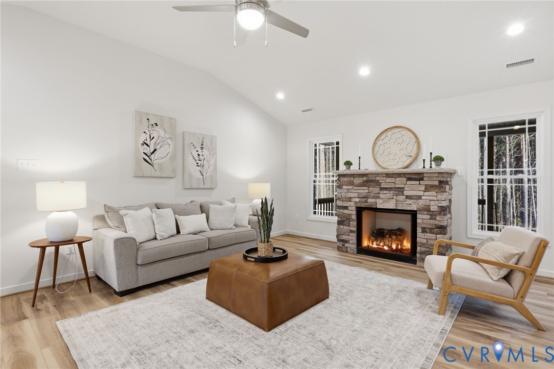 2460 Ballsville Road Powhatan, VA 23139 - Photo 8 of 28 a living room with furniture and a fireplace