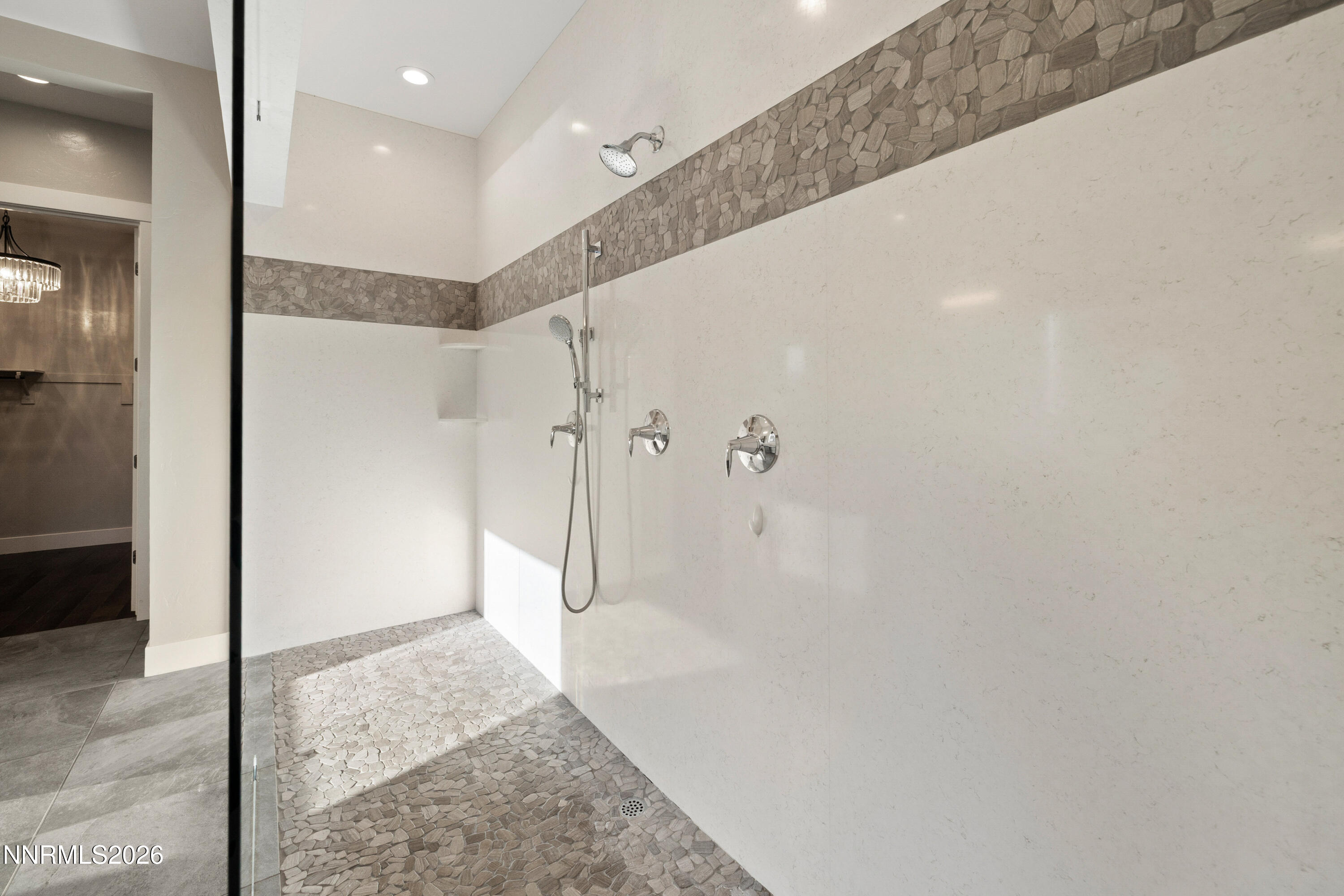 2223 Hillsborough Street Reno, NV 89523 - Photo 20 of 41 a bathroom with a shower and a glass door