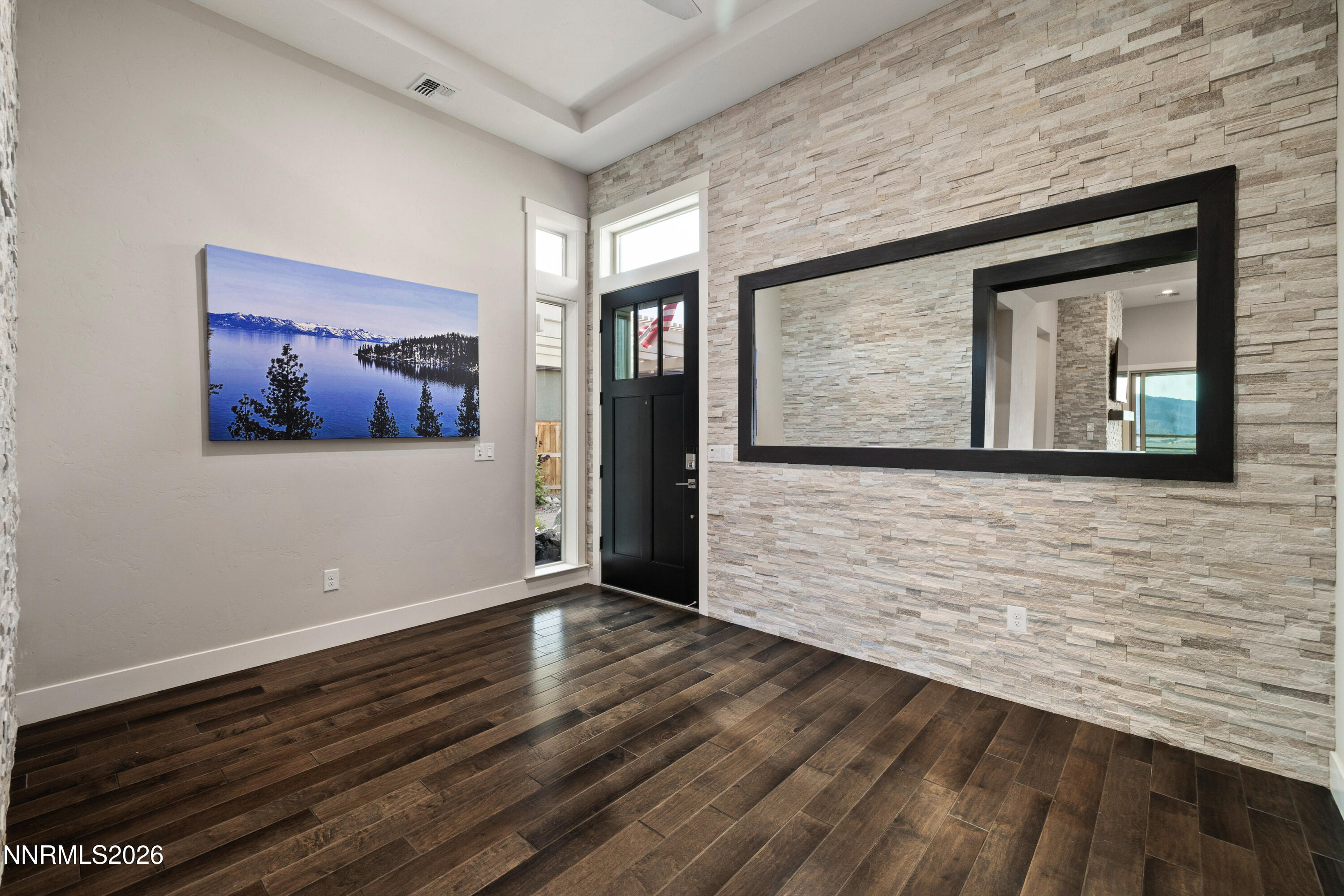 2223 Hillsborough Street Reno, NV 89523 - Photo 29 of 41 a view of an empty room with wooden floor and a window