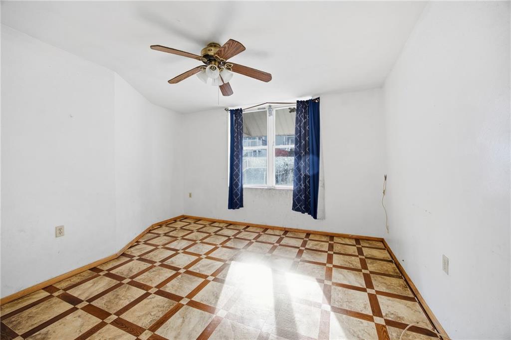 1450 Fleming Avenue McKees Rocks, PA 15136 - Photo 11 of 29 a bedroom with a bed and a window