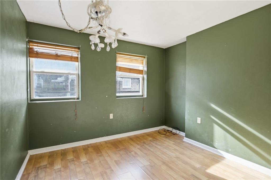 1450 Fleming Avenue McKees Rocks, PA 15136 - Photo 15 of 29 a bedroom with bed and window