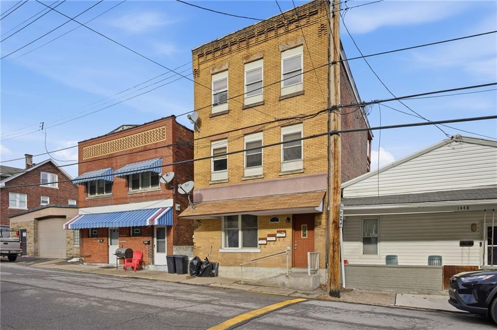 1450 Fleming Avenue McKees Rocks, PA 15136 - Photo 2 of 29 a view of a street with a building and a street