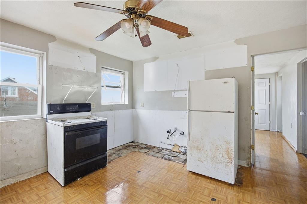 1450 Fleming Avenue McKees Rocks, PA 15136 - Photo 23 of 29 a kitchen with a stove a refrigerator and a sink