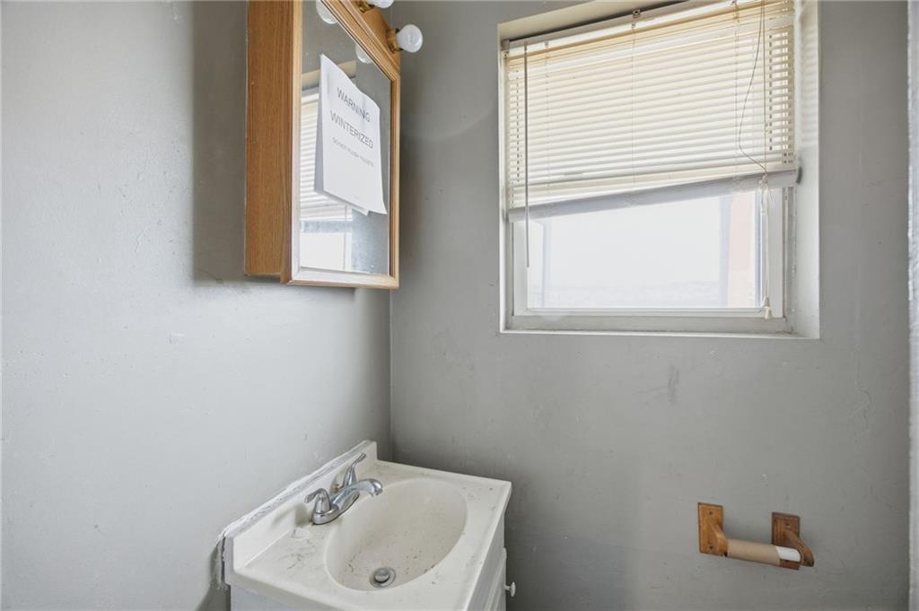 1450 Fleming Avenue McKees Rocks, PA 15136 - Photo 25 of 29 a bathroom with a sink and a window