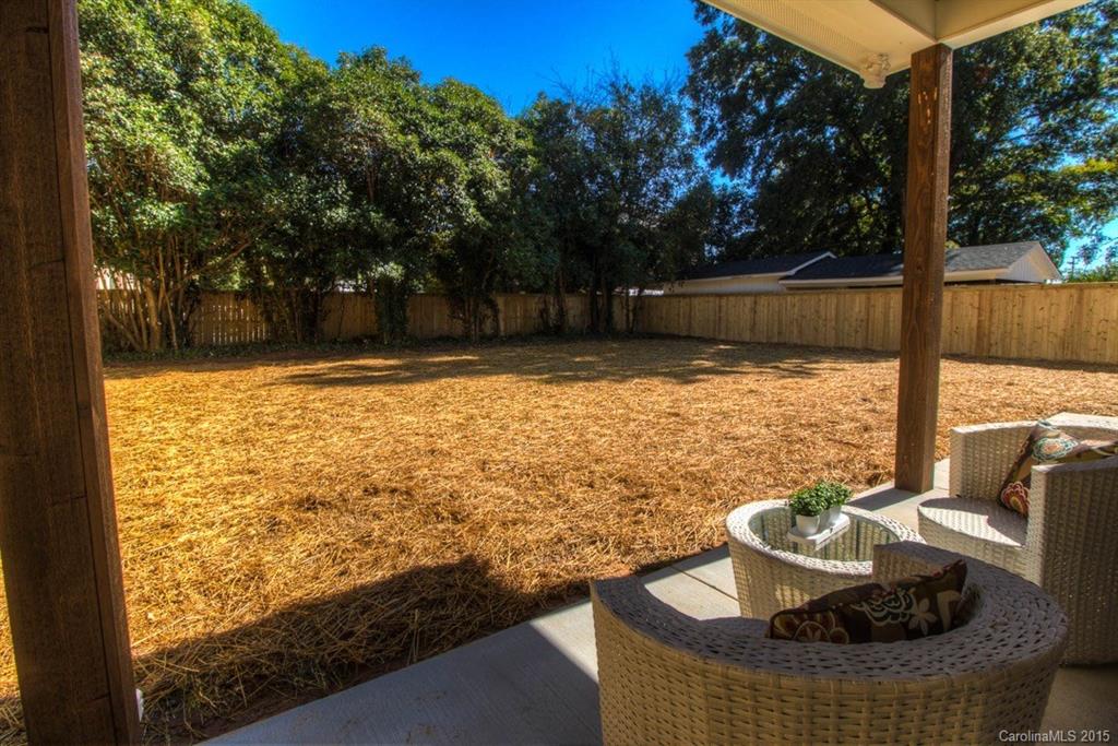 1632 Longfellow Street Charlotte, NC 28205 - Photo 18 of 24 a view of a swimming pool with a patio