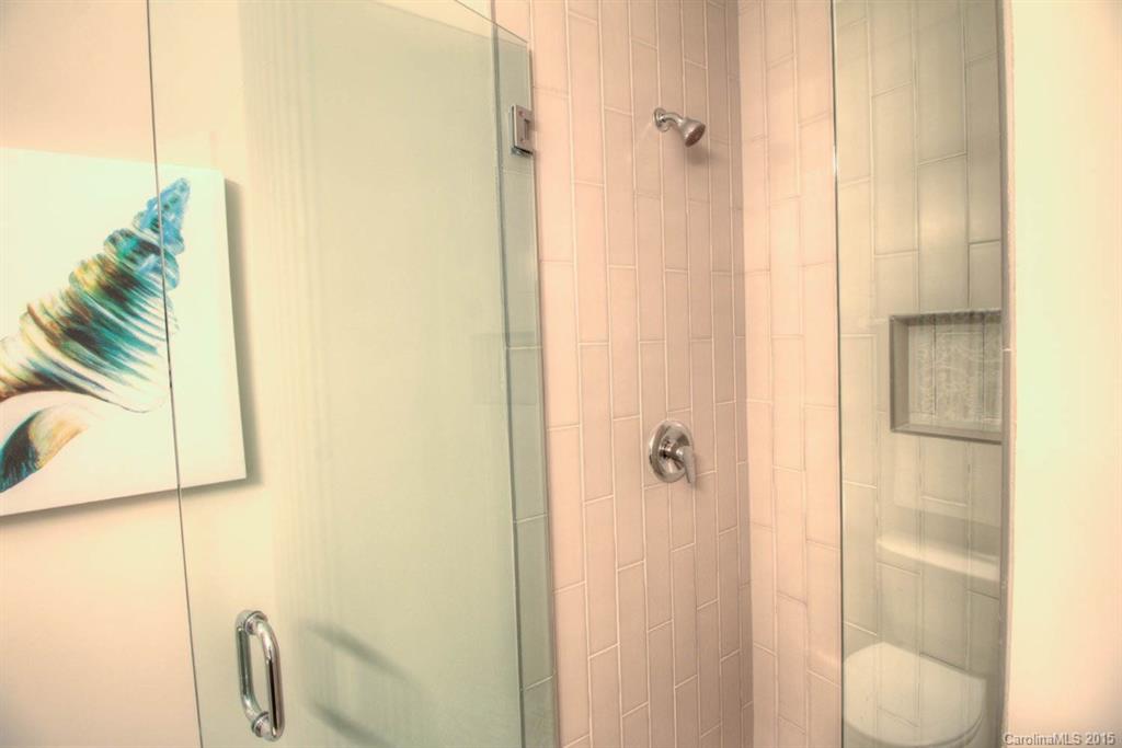1632 Longfellow Street Charlotte, NC 28205 - Photo 22 of 24 a bathroom with a shower