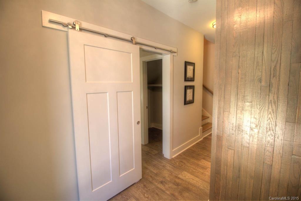 1632 Longfellow Street Charlotte, NC 28205 - Photo 9 of 24 a view of a bathroom with shower