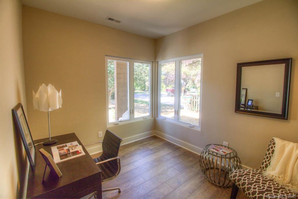 1632 Longfellow Street Charlotte, NC 28205 - Photo 10 of 24 a room with furniture and a window