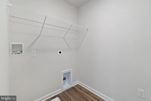 a view of a room with racks on the wall