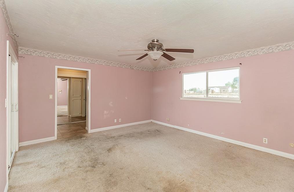 5662 North McCall Avenue Clovis, CA 93619 - Photo 12 of 34 a view of an empty room with a window