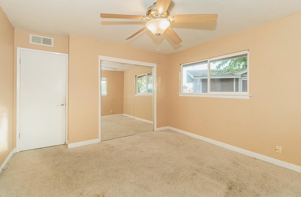 5662 North McCall Avenue Clovis, CA 93619 - Photo 19 of 34 a view of an empty room with a window