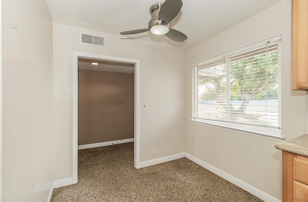5662 North McCall Avenue Clovis, CA 93619 - Photo 10 of 34 a view of an empty room with a window