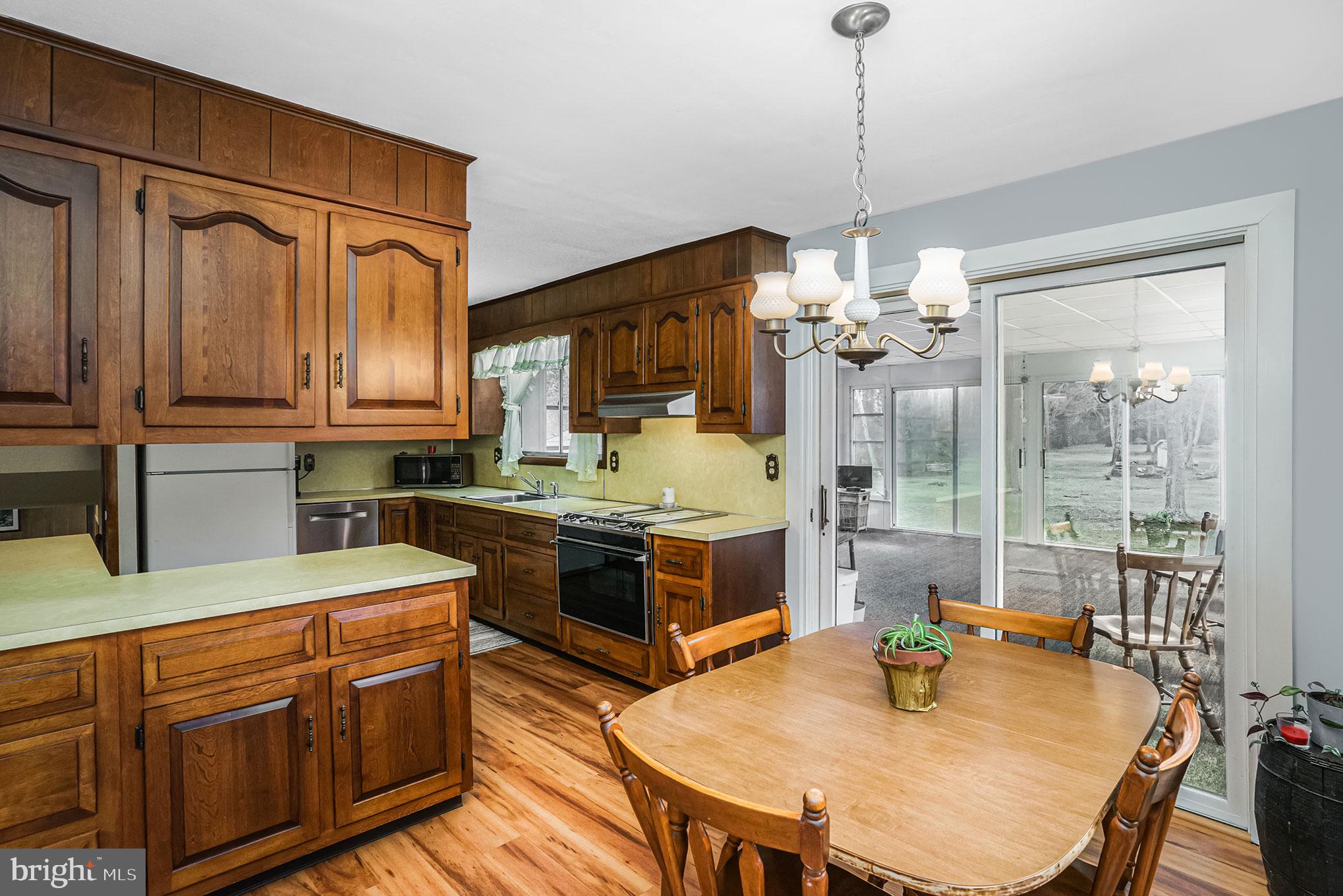 678 Cathcart Road Blue Bell, PA 19422 - Photo 22 of 85 Breakfast area with sliders to Florida Room