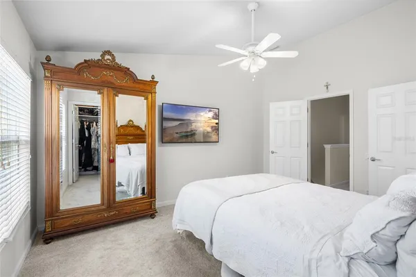 a view of walk in closet with white walls