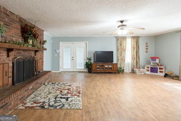 a view of a livingroom with a fireplace