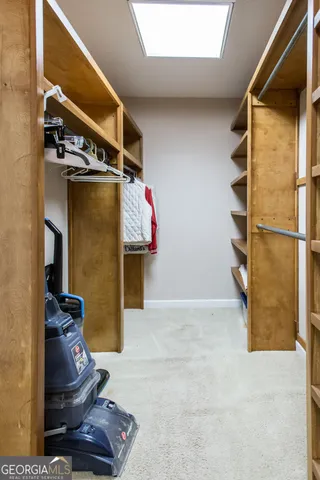 a view of a kitchen with a sink and a vanity