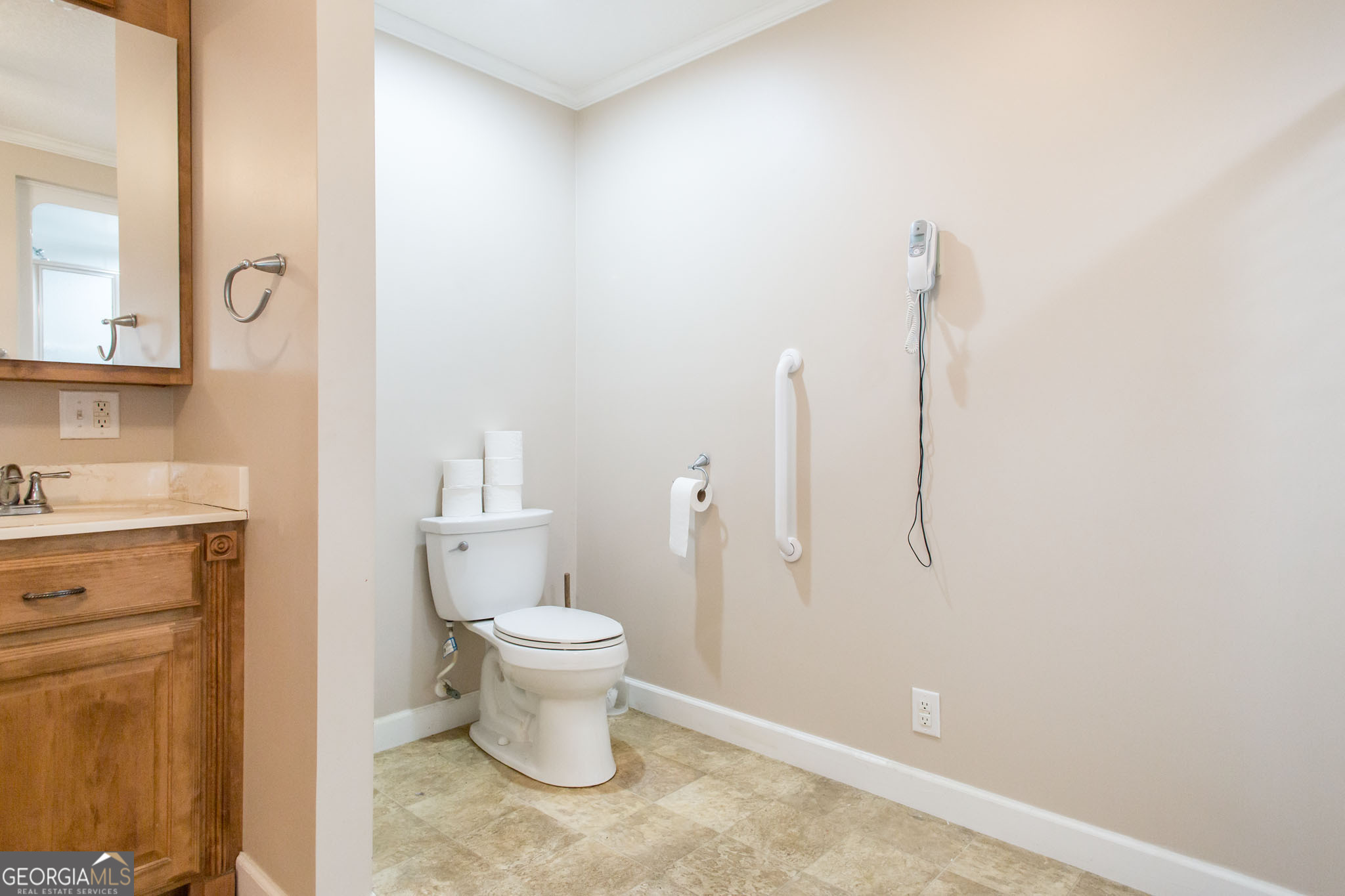 596 Teakwood Road Alma, GA 31510 - Photo 42 of 54 a bathroom with a sink and a toilet