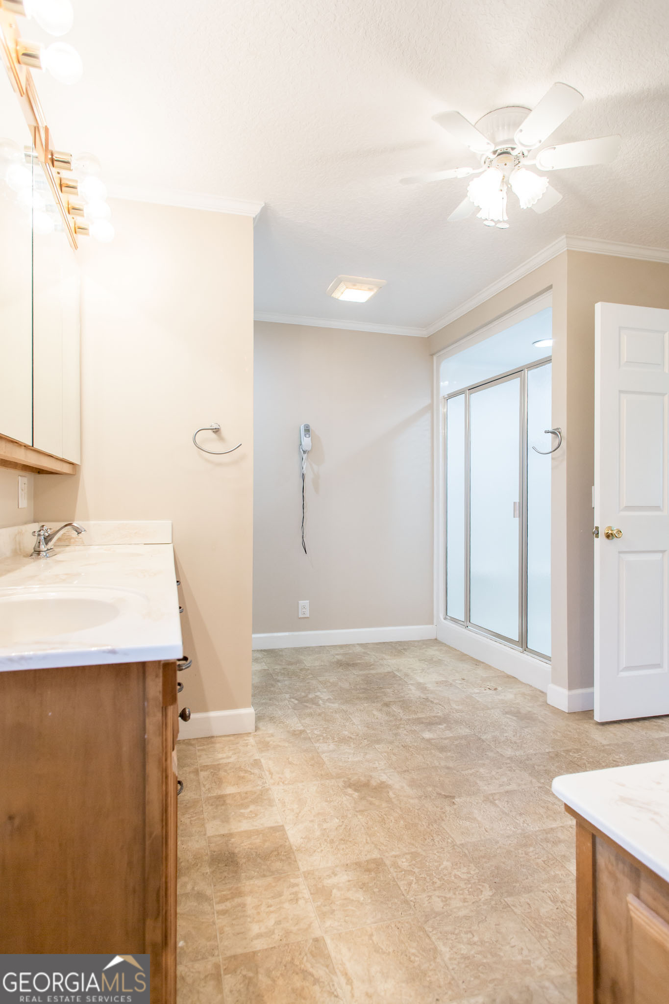 596 Teakwood Road Alma, GA 31510 - Photo 46 of 54 a view of a kitchen with a sink and a vanity