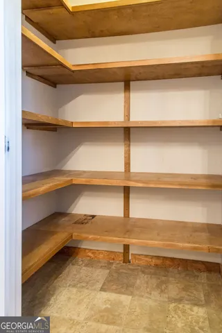 a view of a field with an outdoor space