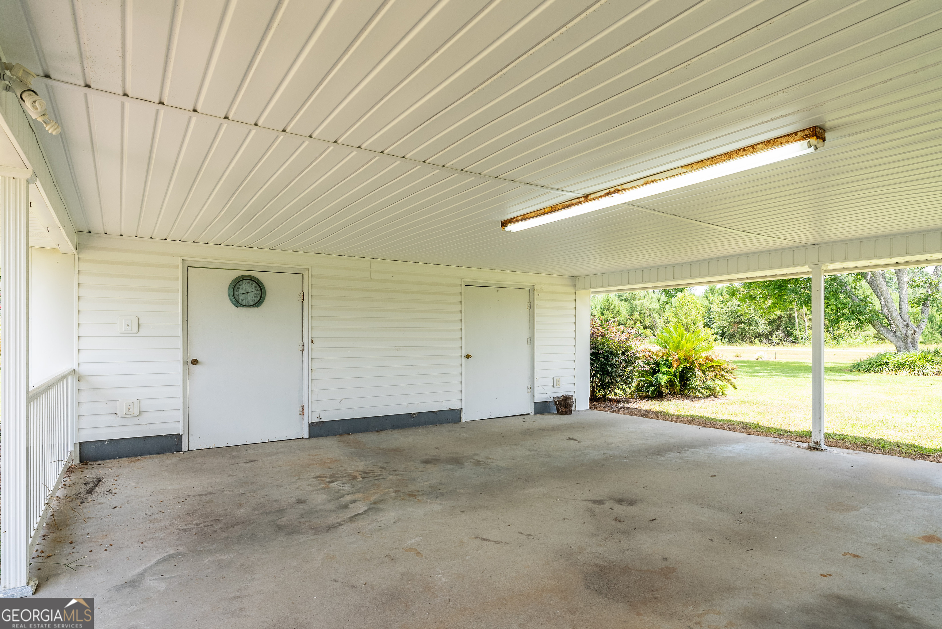 596 Teakwood Road Alma, GA 31510 - Photo 51 of 54 a view of an empty room with a window