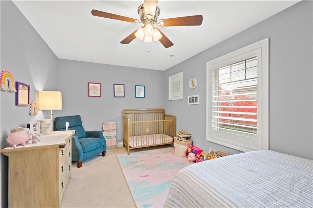 225 Meridan Street Pittsburgh, PA 15211 - Photo 16 of 25 a bedroom with a bed and a couch