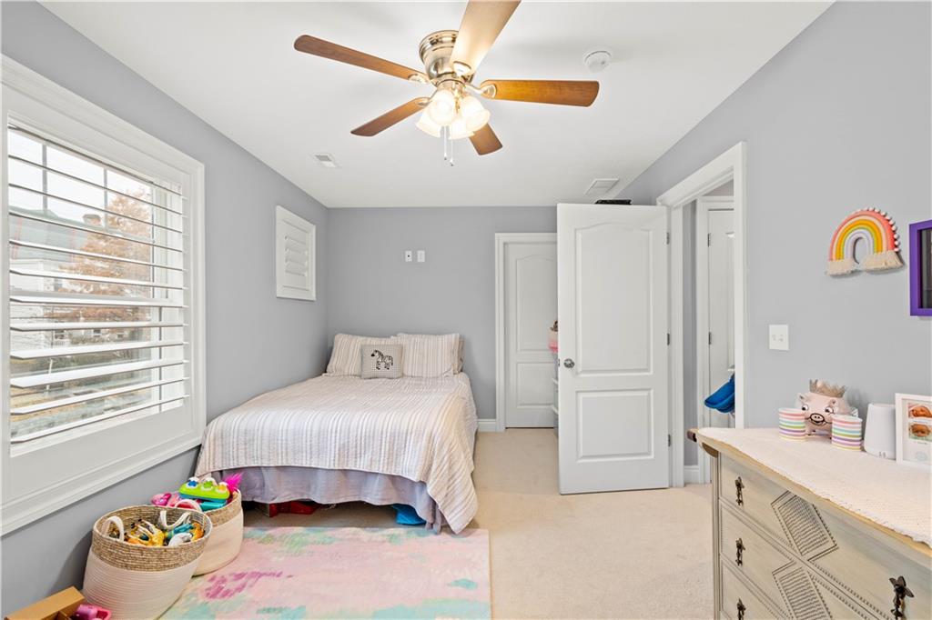 225 Meridan Street Pittsburgh, PA 15211 - Photo 17 of 25 a bedroom with a bed and a window