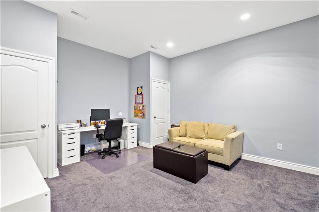 225 Meridan Street Pittsburgh, PA 15211 - Photo 21 of 25 a living room with furniture and a flat screen tv