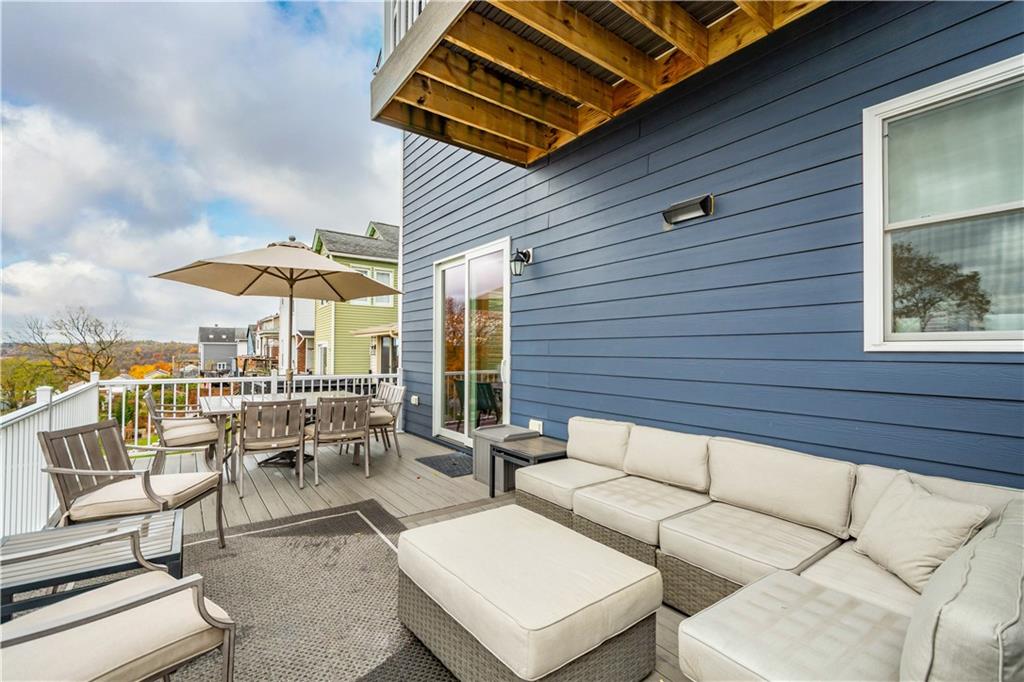 225 Meridan Street Pittsburgh, PA 15211 - Photo 24 of 25 a patio with patio a couch and chairs