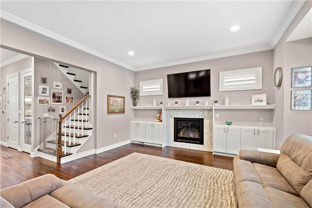 225 Meridan Street Pittsburgh, PA 15211 - Photo 3 of 25 a bedroom with furniture fireplace and window