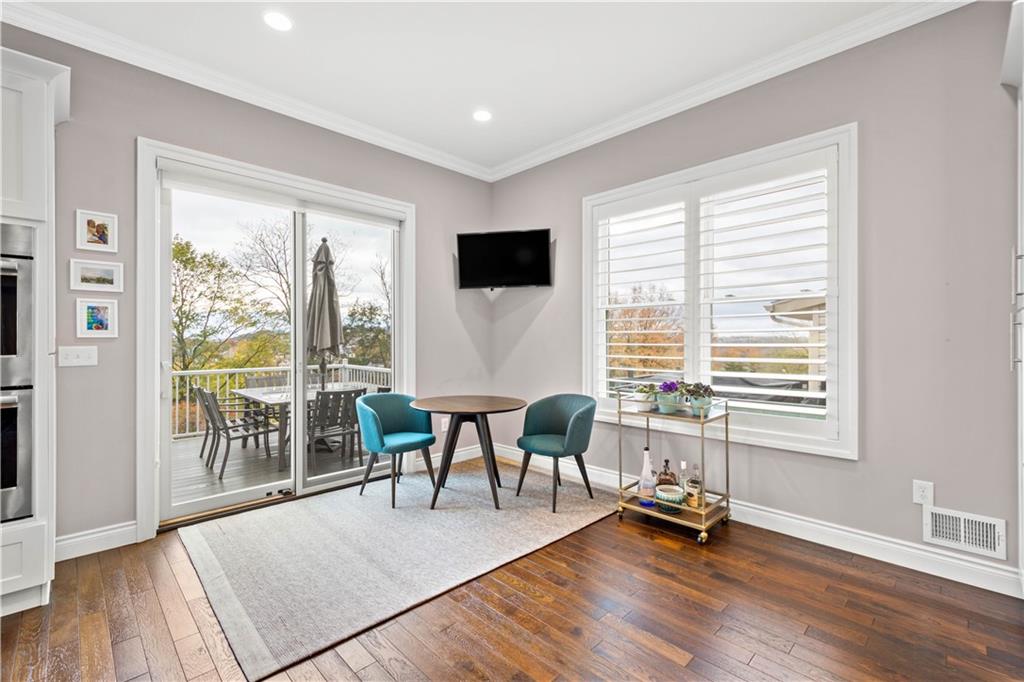225 Meridan Street Pittsburgh, PA 15211 - Photo 10 of 25 a view of a livingroom with furniture wooden floor and a window