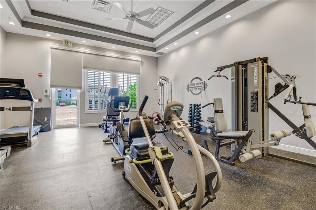 29 High Point Circle East, Unit 508 Naples, FL 34103 - Photo 31 of 35 a view of a room with gym equipment