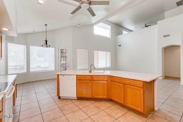 a view of staircase with wooden floor and white walls