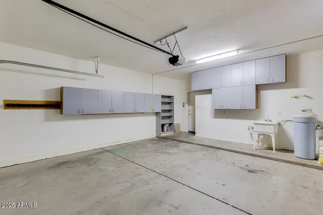 a view of yard with swimming pool and green space