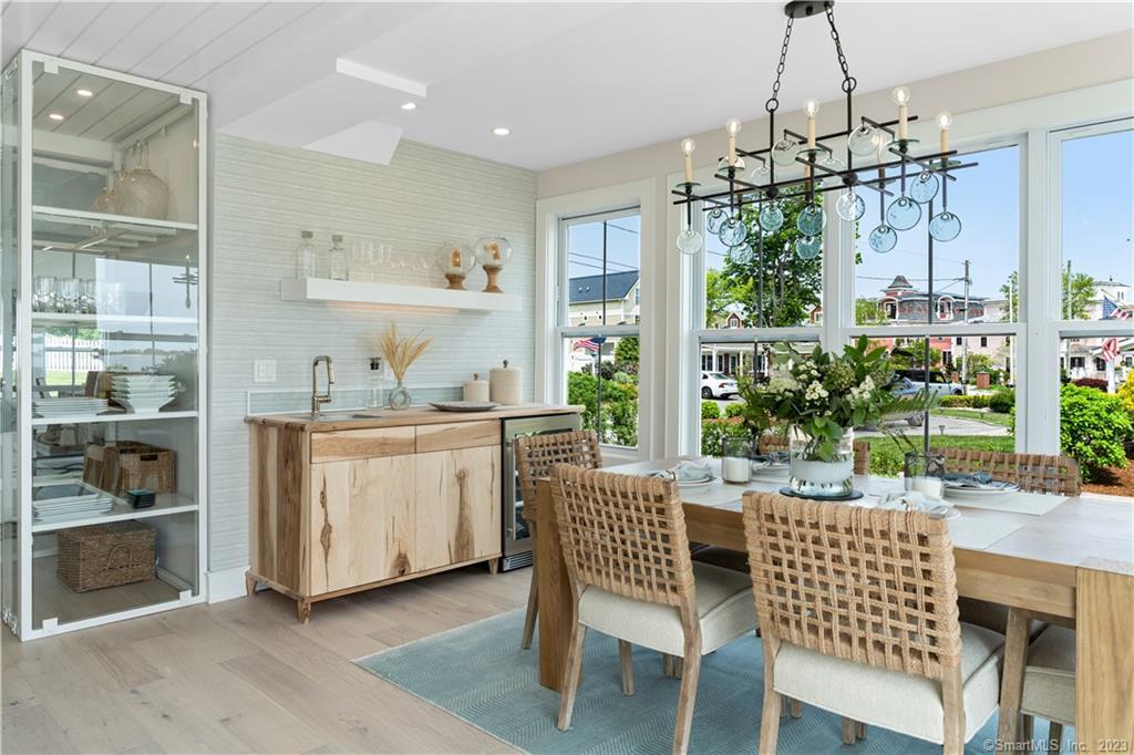 16 Cove Street Old Saybrook, CT 06475 - Photo 1 of 1 a dining room with furniture and window