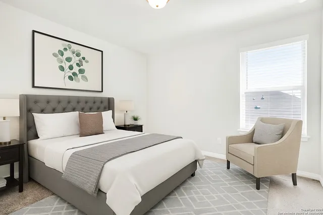 a bedroom with a bed and glass window