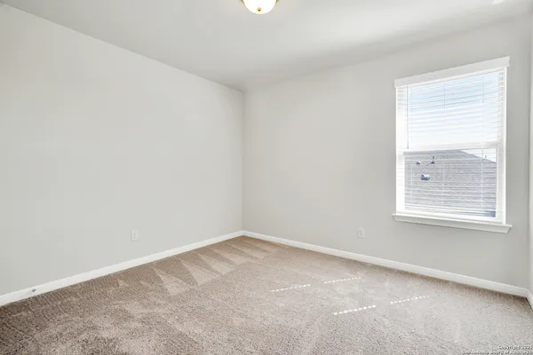 an empty room with a window