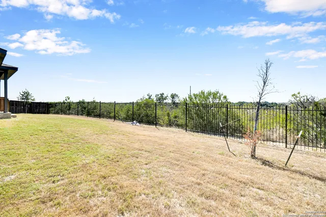 a view of a lake and a yard