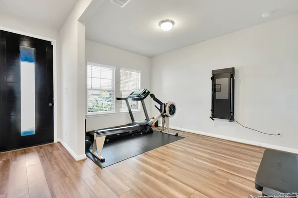 a view of a room with gym equipment