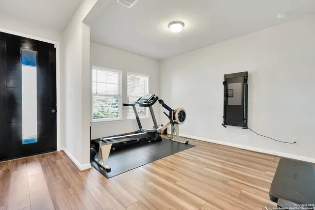 a view of a room with gym equipment