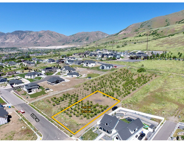 1985 South 100 West, Unit 16 Perry, UT 84302 - Photo 1 of 7 Expansive 0.50-acre lot featuring a clear buildable area and established neighboring homes