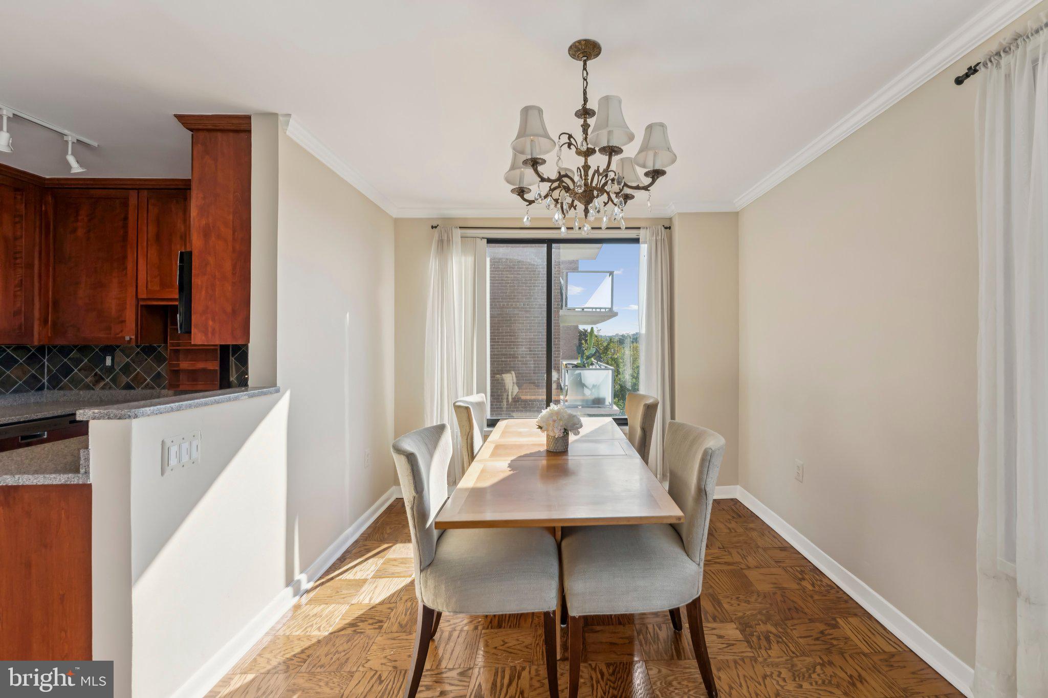 2501 Calvert Street Northwest, Unit 701 Washington, DC 20008 - Photo 11 of 31 Dining Room with Picture Windows